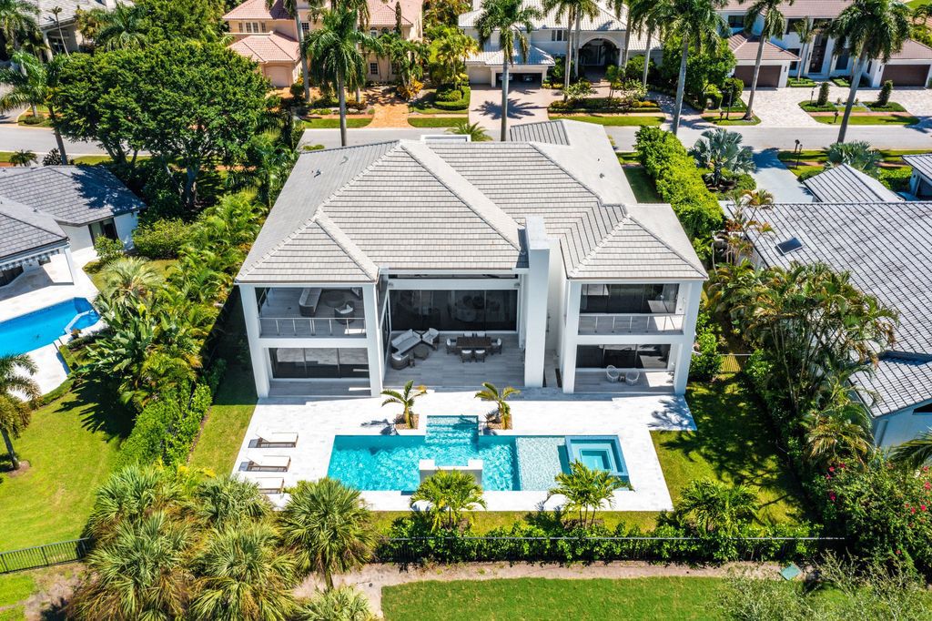 The Home in Boca Raton, a brand new modern estate in the world-renowned St. Andrew CC was designed by George Brewer Architect and decorated by Zelman Design is now available for sale. This home located at 17192 Northway Cir, Boca Raton, Florida