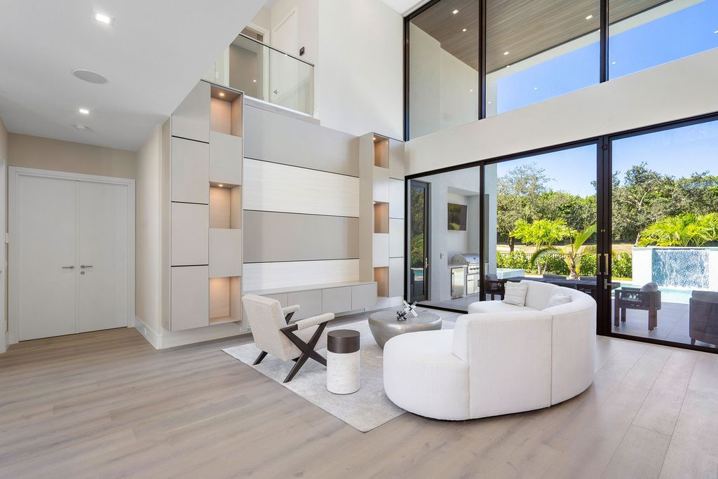 The Home in Boca Raton, a brand new modern estate in the world-renowned St. Andrew CC was designed by George Brewer Architect and decorated by Zelman Design is now available for sale. This home located at 17192 Northway Cir, Boca Raton, Florida