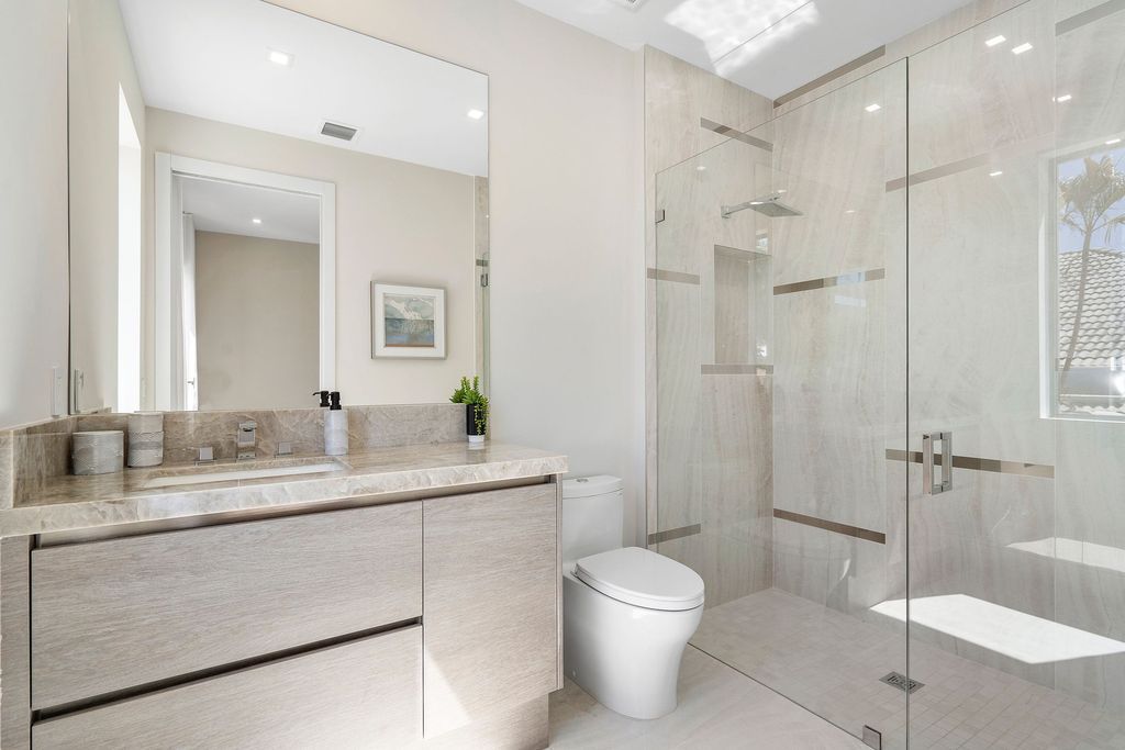 The Home in Boca Raton, a brand new modern estate in the world-renowned St. Andrew CC was designed by George Brewer Architect and decorated by Zelman Design is now available for sale. This home located at 17192 Northway Cir, Boca Raton, Florida