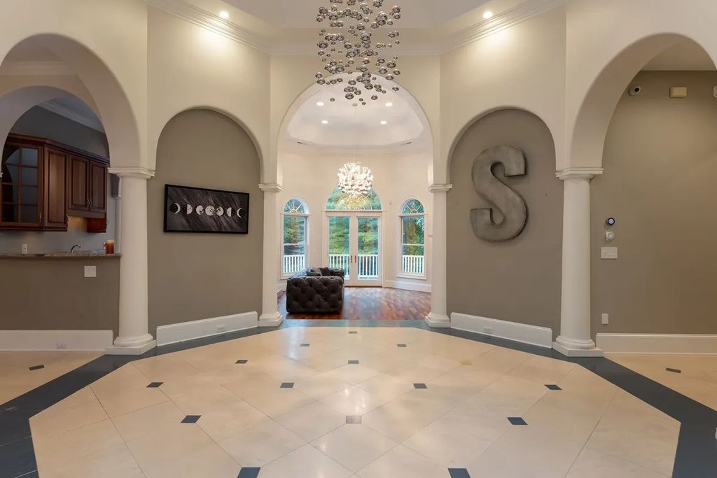 The Residence in Asheville is carefully considered and thoughtfully planned with plenty of entertaining spaces, now available for sale. This home located at 18 Cedar Hill Dr, Asheville, North Carolina