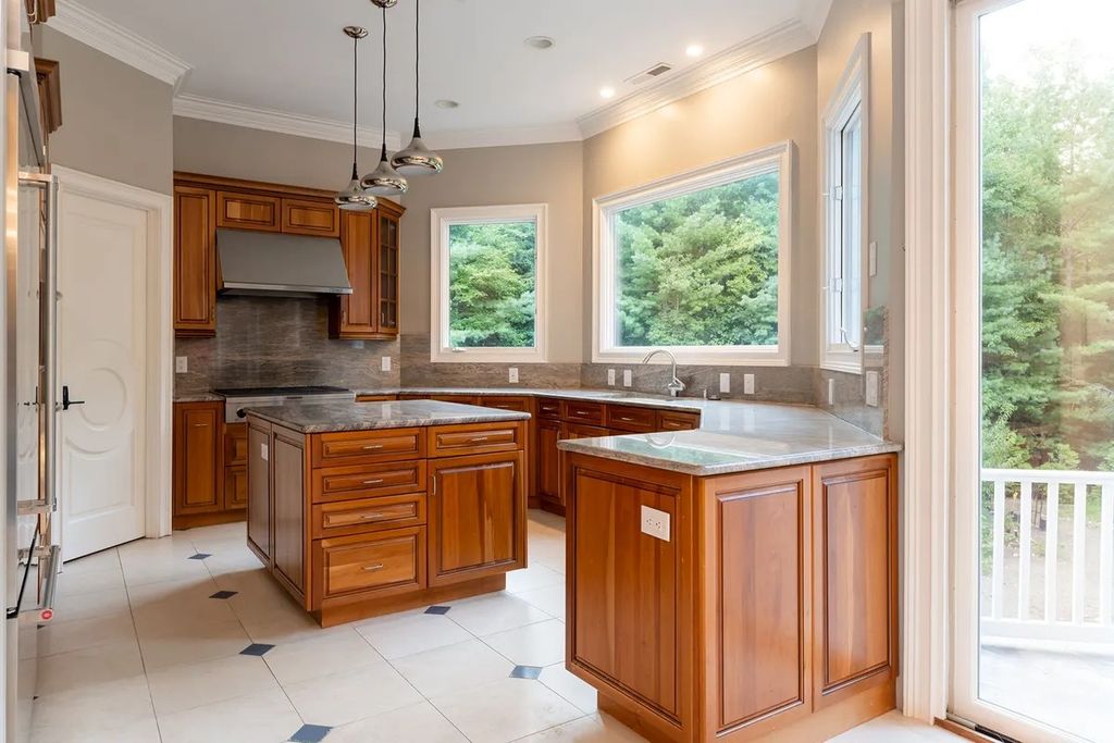 The Residence in Asheville is carefully considered and thoughtfully planned with plenty of entertaining spaces, now available for sale. This home located at 18 Cedar Hill Dr, Asheville, North Carolina