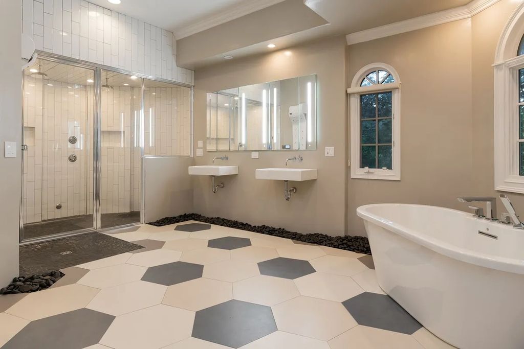 The Residence in Asheville is carefully considered and thoughtfully planned with plenty of entertaining spaces, now available for sale. This home located at 18 Cedar Hill Dr, Asheville, North Carolina