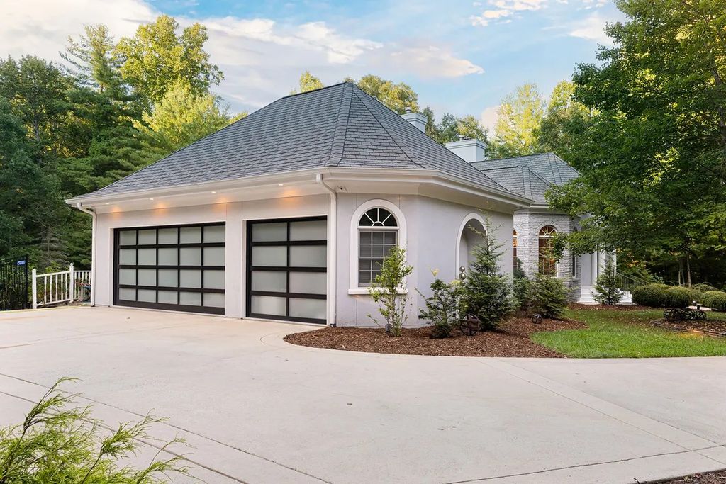 The Residence in Asheville is carefully considered and thoughtfully planned with plenty of entertaining spaces, now available for sale. This home located at 18 Cedar Hill Dr, Asheville, North Carolina