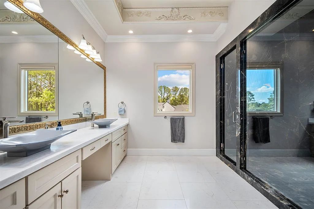 The Estate in Friendswood, an exceptional Mediterranean home with a breathtaking resort style backyard on 5 private wooded acres located along one of Friendswood’s most coveted streets is now available for sale. This home located at 10B Wilderness Trl, Friendswood, Texas