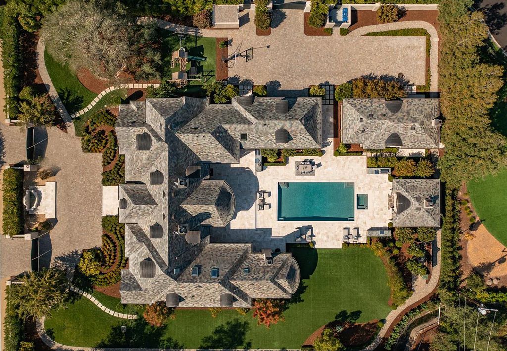 54 Mulberry Ln, Atherton, California is meticulously maintained estate sits on over an acre of level, flat grounds and positioned on the lot to capture abundant light throughout the day.