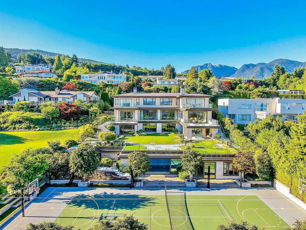 The Estate in West Vancouver is a luxurious home projecting architectural elegance and grandeur with classic modern design and rich materials now available for sale. This home located at 730 Fairmile Rd, West Vancouver, BC V7S 1R2, Canada; offering 08 bedrooms and 11 bathrooms with 14,759 square feet of living spaces.