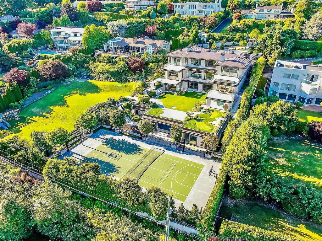 The Estate in West Vancouver is a luxurious home projecting architectural elegance and grandeur with classic modern design and rich materials now available for sale. This home located at 730 Fairmile Rd, West Vancouver, BC V7S 1R2, Canada; offering 08 bedrooms and 11 bathrooms with 14,759 square feet of living spaces.