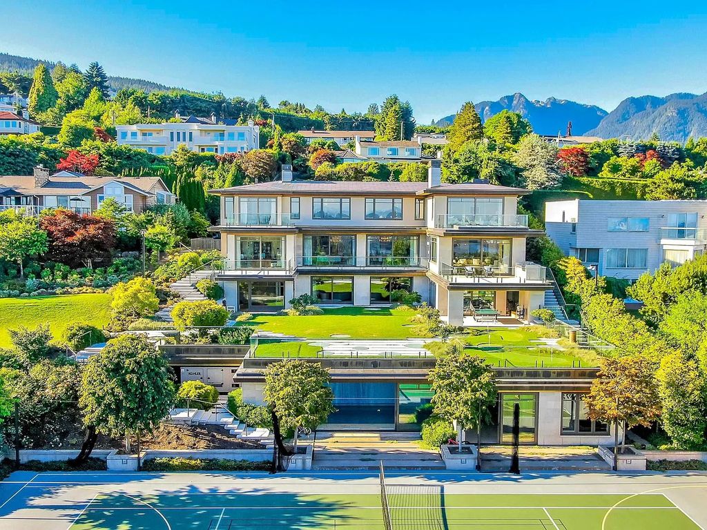 The Estate in West Vancouver is a luxurious home projecting architectural elegance and grandeur with classic modern design and rich materials now available for sale. This home located at 730 Fairmile Rd, West Vancouver, BC V7S 1R2, Canada; offering 08 bedrooms and 11 bathrooms with 14,759 square feet of living spaces.
