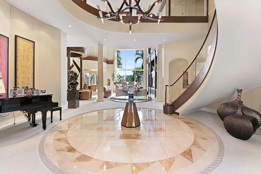 The Estate in Jupiter, an intracoastal masterpiece in The Club of Admirals Cove was executed by the talents of the design team of Affiniti Architechts, Parker-Yannette Landscape, Decorators Unlimited and Turtle Beach Construction is now available for sale. This home located at 192 Spyglass Ct, Jupiter, Florida
