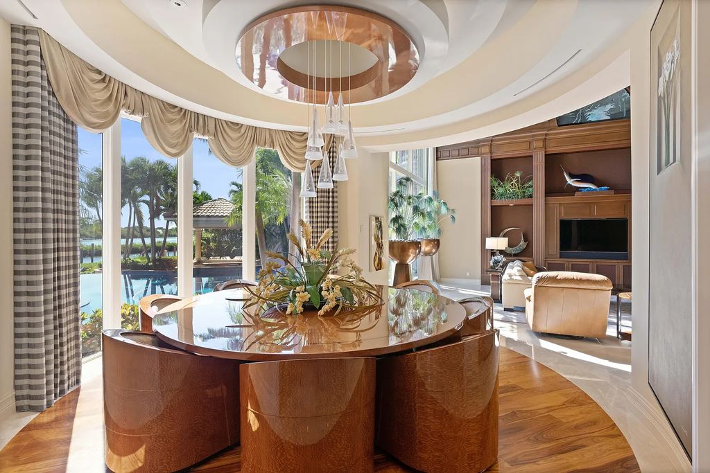 The Estate in Jupiter, an intracoastal masterpiece in The Club of Admirals Cove was executed by the talents of the design team of Affiniti Architechts, Parker-Yannette Landscape, Decorators Unlimited and Turtle Beach Construction is now available for sale. This home located at 192 Spyglass Ct, Jupiter, Florida