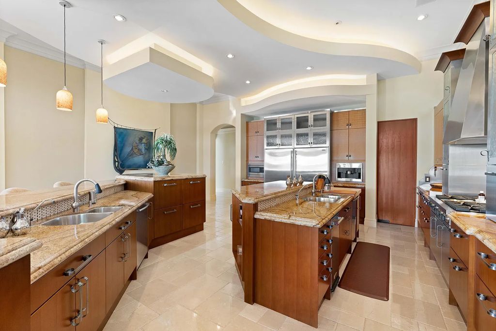 The Estate in Jupiter, an intracoastal masterpiece in The Club of Admirals Cove was executed by the talents of the design team of Affiniti Architechts, Parker-Yannette Landscape, Decorators Unlimited and Turtle Beach Construction is now available for sale. This home located at 192 Spyglass Ct, Jupiter, Florida