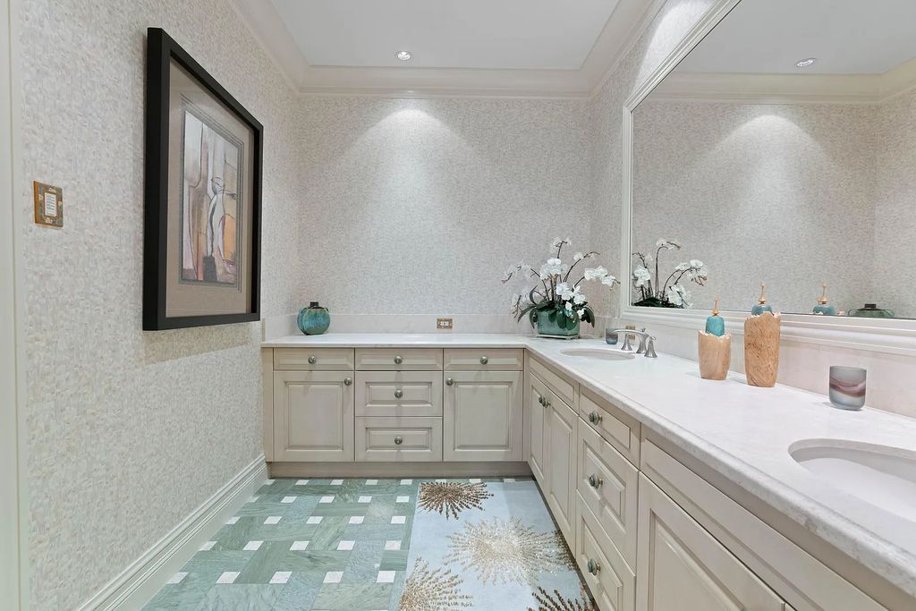 The Estate in Jupiter, an intracoastal masterpiece in The Club of Admirals Cove was executed by the talents of the design team of Affiniti Architechts, Parker-Yannette Landscape, Decorators Unlimited and Turtle Beach Construction is now available for sale. This home located at 192 Spyglass Ct, Jupiter, Florida