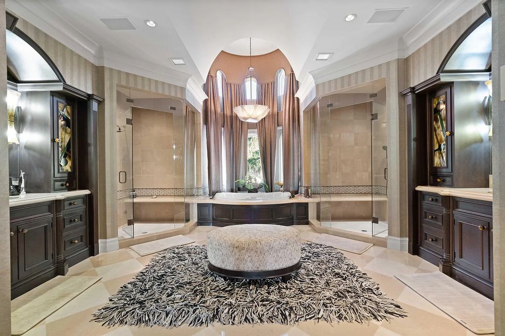 The Estate in Jupiter, an intracoastal masterpiece in The Club of Admirals Cove was executed by the talents of the design team of Affiniti Architechts, Parker-Yannette Landscape, Decorators Unlimited and Turtle Beach Construction is now available for sale. This home located at 192 Spyglass Ct, Jupiter, Florida
