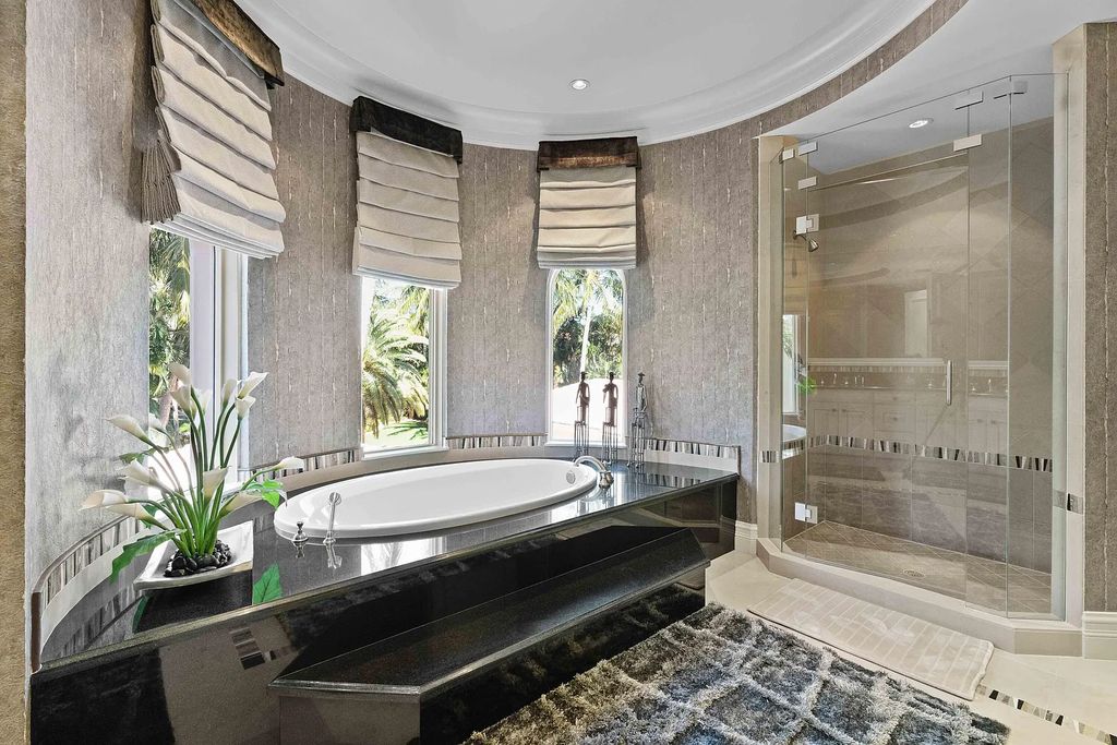 The Estate in Jupiter, an intracoastal masterpiece in The Club of Admirals Cove was executed by the talents of the design team of Affiniti Architechts, Parker-Yannette Landscape, Decorators Unlimited and Turtle Beach Construction is now available for sale. This home located at 192 Spyglass Ct, Jupiter, Florida