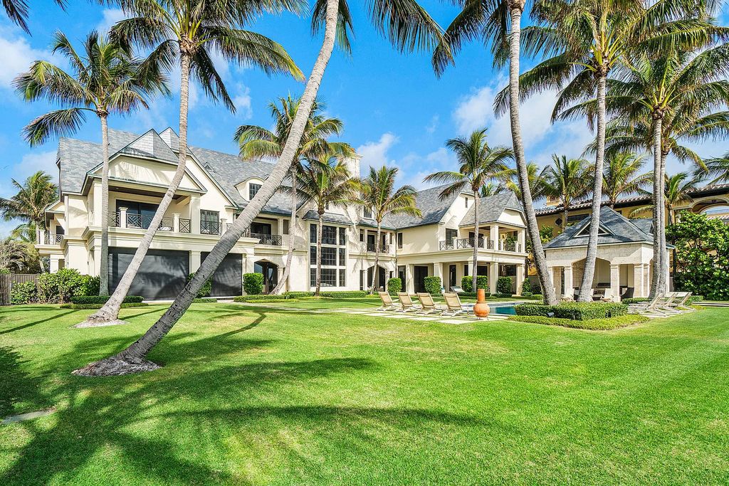 The Mansion in Highland Beach, a trophy property delivers over 150 feet of private manicured beachfront  on nearly 2 acres featuring modern French-Eclectic architecture, transitional interiors is now available for sale. This home located at 2455 S Ocean Blvd, Highland Beach, Florida