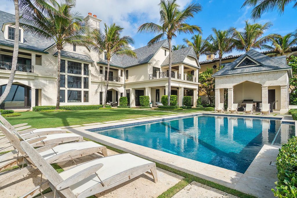 The Mansion in Highland Beach, a trophy property delivers over 150 feet of private manicured beachfront  on nearly 2 acres featuring modern French-Eclectic architecture, transitional interiors is now available for sale. This home located at 2455 S Ocean Blvd, Highland Beach, Florida