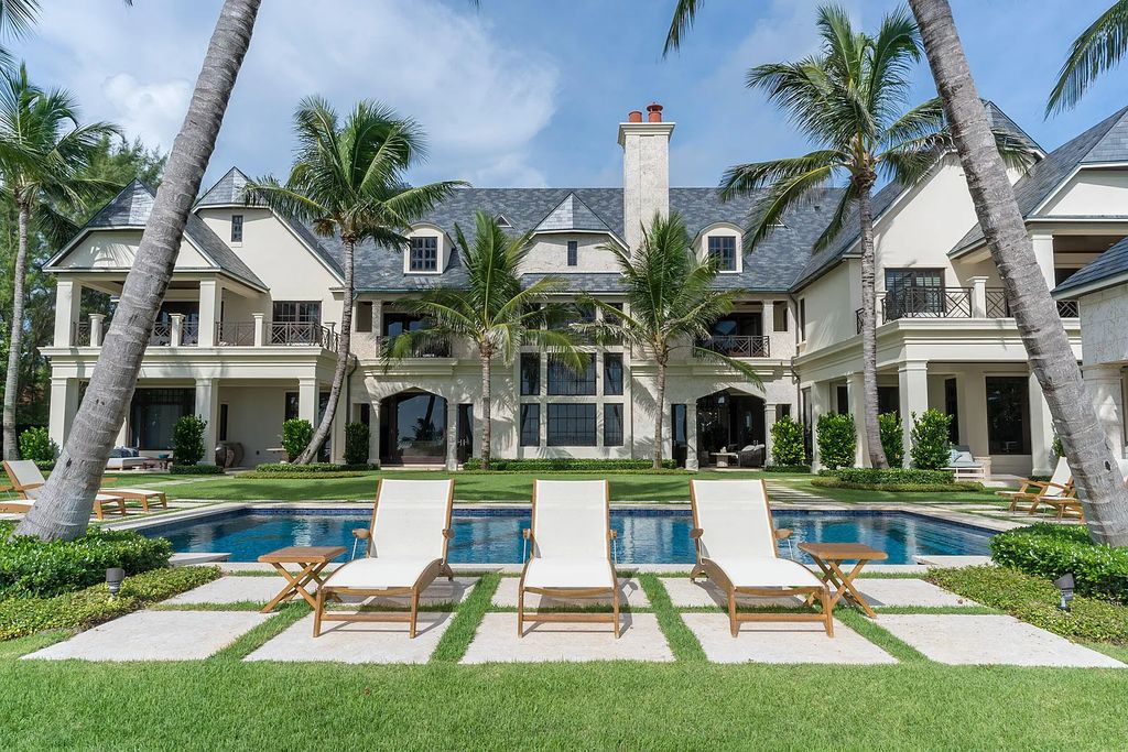 The Mansion in Highland Beach, a trophy property delivers over 150 feet of private manicured beachfront  on nearly 2 acres featuring modern French-Eclectic architecture, transitional interiors is now available for sale. This home located at 2455 S Ocean Blvd, Highland Beach, Florida