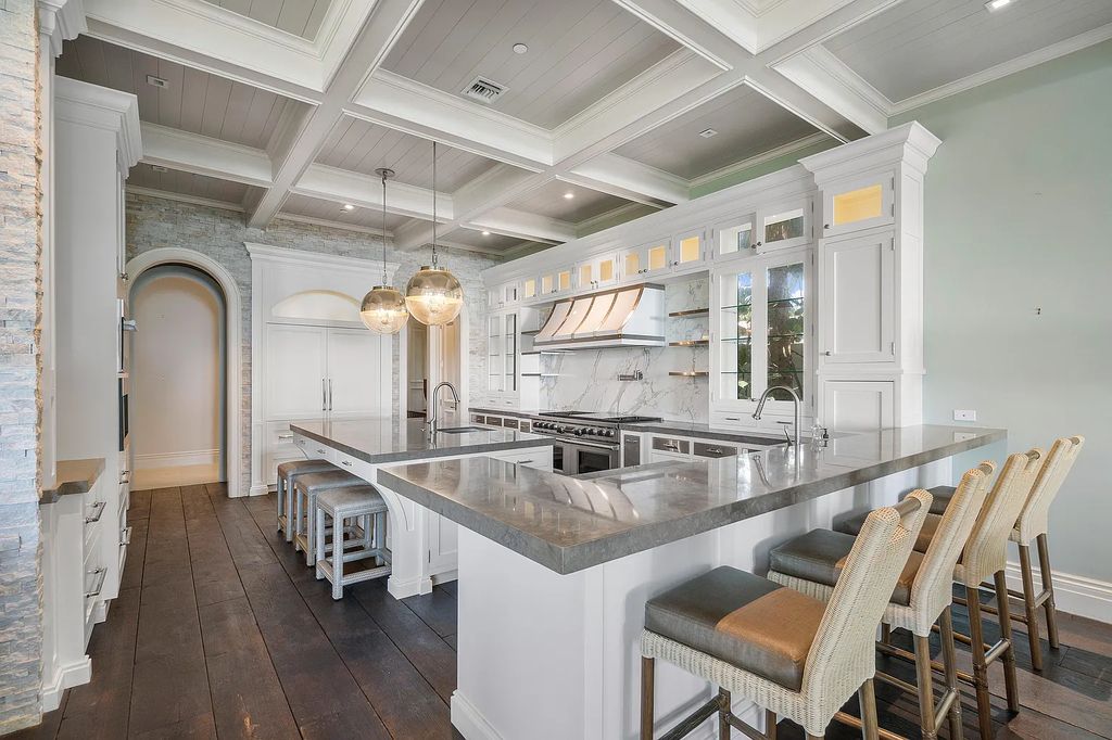 The Mansion in Highland Beach, a trophy property delivers over 150 feet of private manicured beachfront  on nearly 2 acres featuring modern French-Eclectic architecture, transitional interiors is now available for sale. This home located at 2455 S Ocean Blvd, Highland Beach, Florida