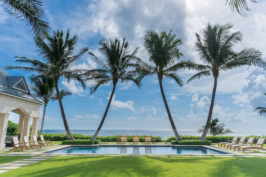 The Mansion in Highland Beach, a trophy property delivers over 150 feet of private manicured beachfront  on nearly 2 acres featuring modern French-Eclectic architecture, transitional interiors is now available for sale. This home located at 2455 S Ocean Blvd, Highland Beach, Florida