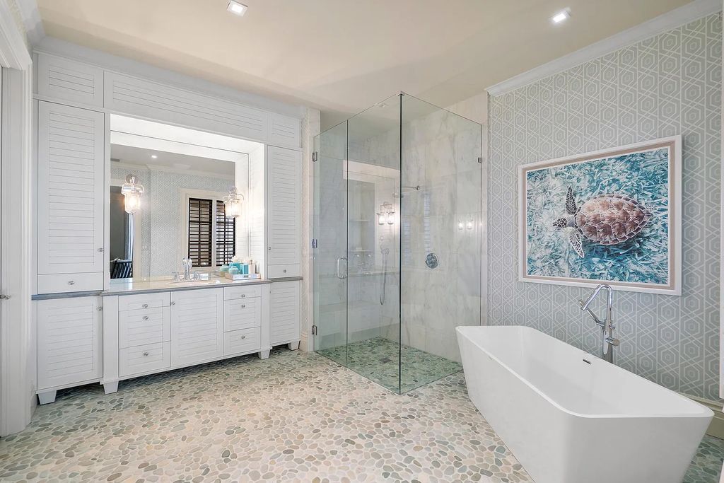 The Mansion in Highland Beach, a trophy property delivers over 150 feet of private manicured beachfront  on nearly 2 acres featuring modern French-Eclectic architecture, transitional interiors is now available for sale. This home located at 2455 S Ocean Blvd, Highland Beach, Florida