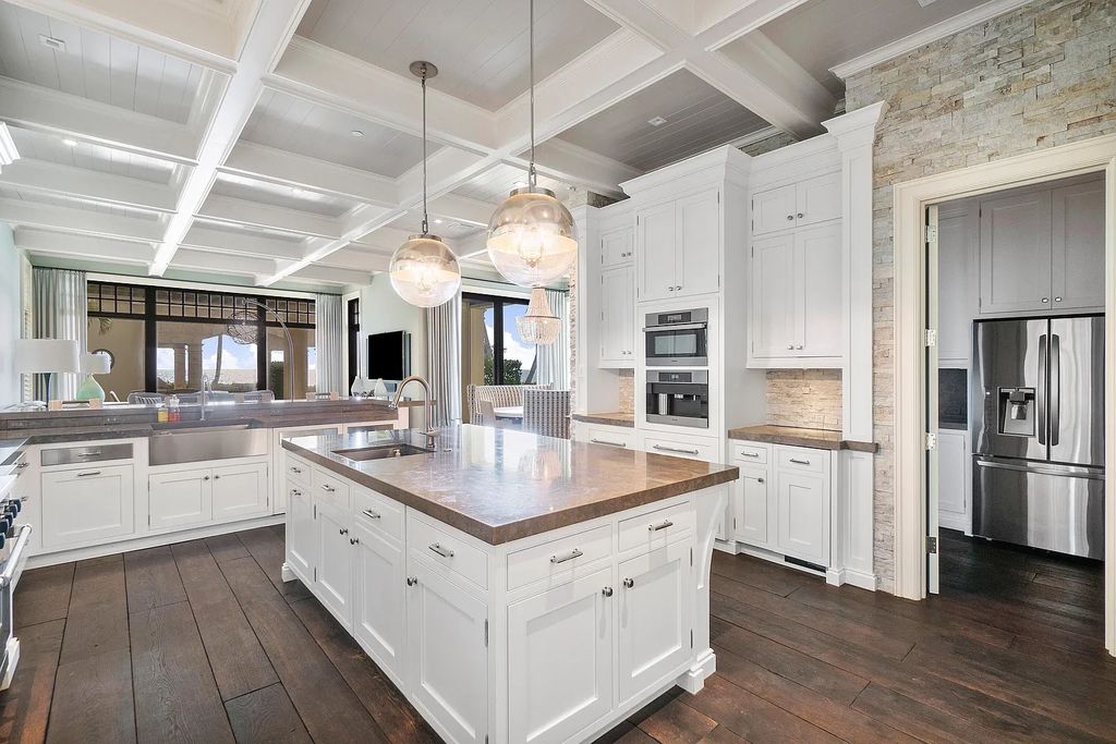 The Mansion in Highland Beach, a trophy property delivers over 150 feet of private manicured beachfront  on nearly 2 acres featuring modern French-Eclectic architecture, transitional interiors is now available for sale. This home located at 2455 S Ocean Blvd, Highland Beach, Florida