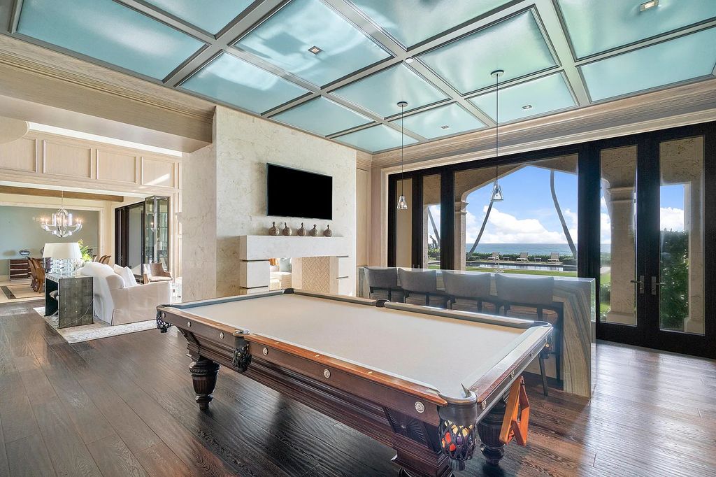 The Mansion in Highland Beach, a trophy property delivers over 150 feet of private manicured beachfront  on nearly 2 acres featuring modern French-Eclectic architecture, transitional interiors is now available for sale. This home located at 2455 S Ocean Blvd, Highland Beach, Florida