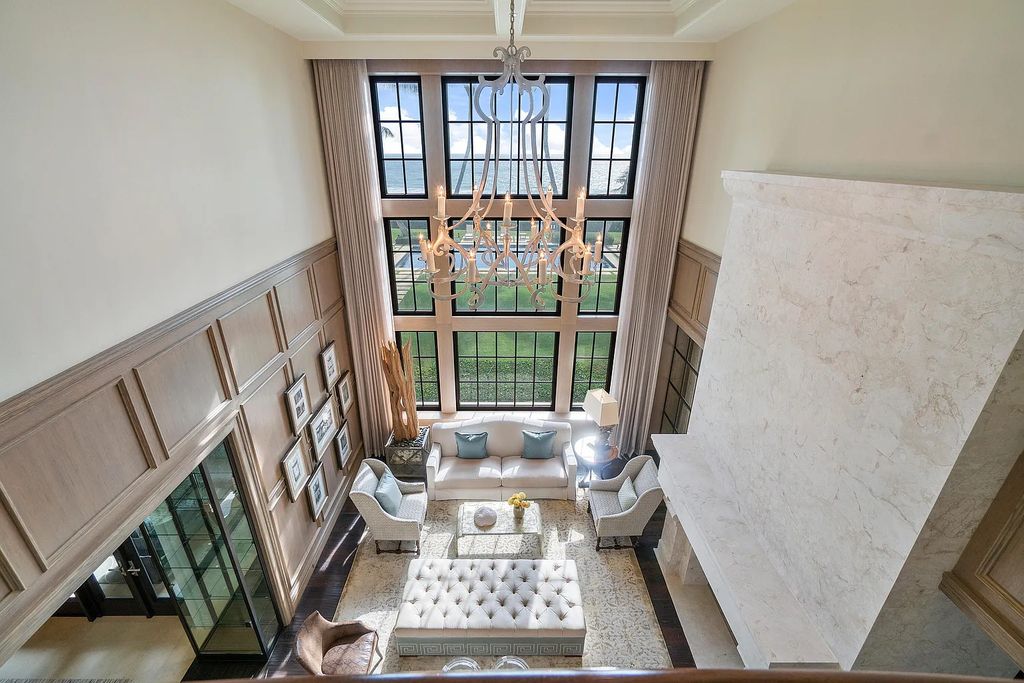 The Mansion in Highland Beach, a trophy property delivers over 150 feet of private manicured beachfront  on nearly 2 acres featuring modern French-Eclectic architecture, transitional interiors is now available for sale. This home located at 2455 S Ocean Blvd, Highland Beach, Florida