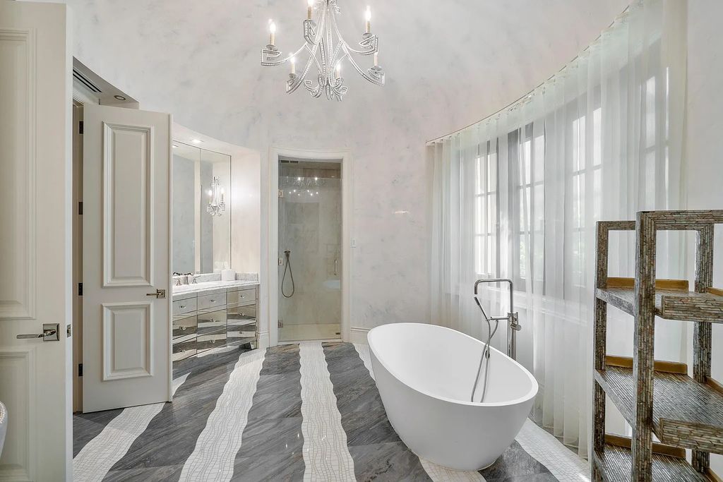 The Mansion in Highland Beach, a trophy property delivers over 150 feet of private manicured beachfront  on nearly 2 acres featuring modern French-Eclectic architecture, transitional interiors is now available for sale. This home located at 2455 S Ocean Blvd, Highland Beach, Florida