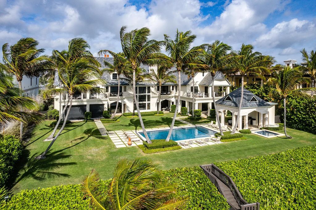 The Mansion in Highland Beach, a trophy property delivers over 150 feet of private manicured beachfront  on nearly 2 acres featuring modern French-Eclectic architecture, transitional interiors is now available for sale. This home located at 2455 S Ocean Blvd, Highland Beach, Florida