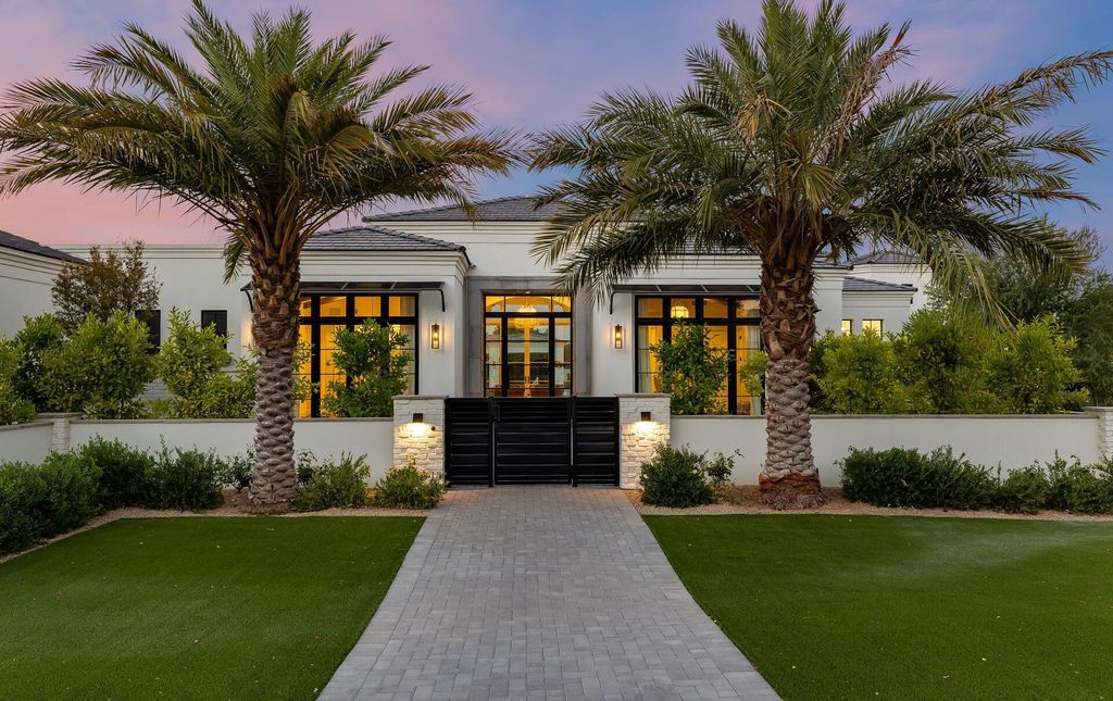 8311 N 53rd Street, Paradise Valley, Arizona is a transitional Mediterranean estate with amazing Mummy mountain views and tons of privacy showcases the pinnacle of resort style living. 