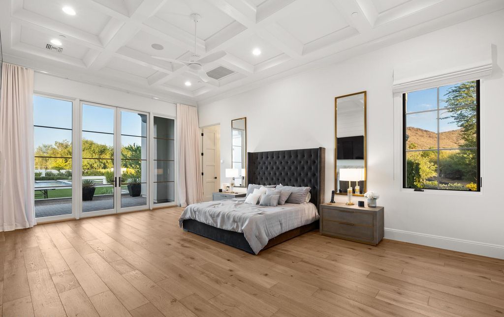 8311 N 53rd Street, Paradise Valley, Arizona is a transitional Mediterranean estate with amazing Mummy mountain views and tons of privacy showcases the pinnacle of resort style living. 