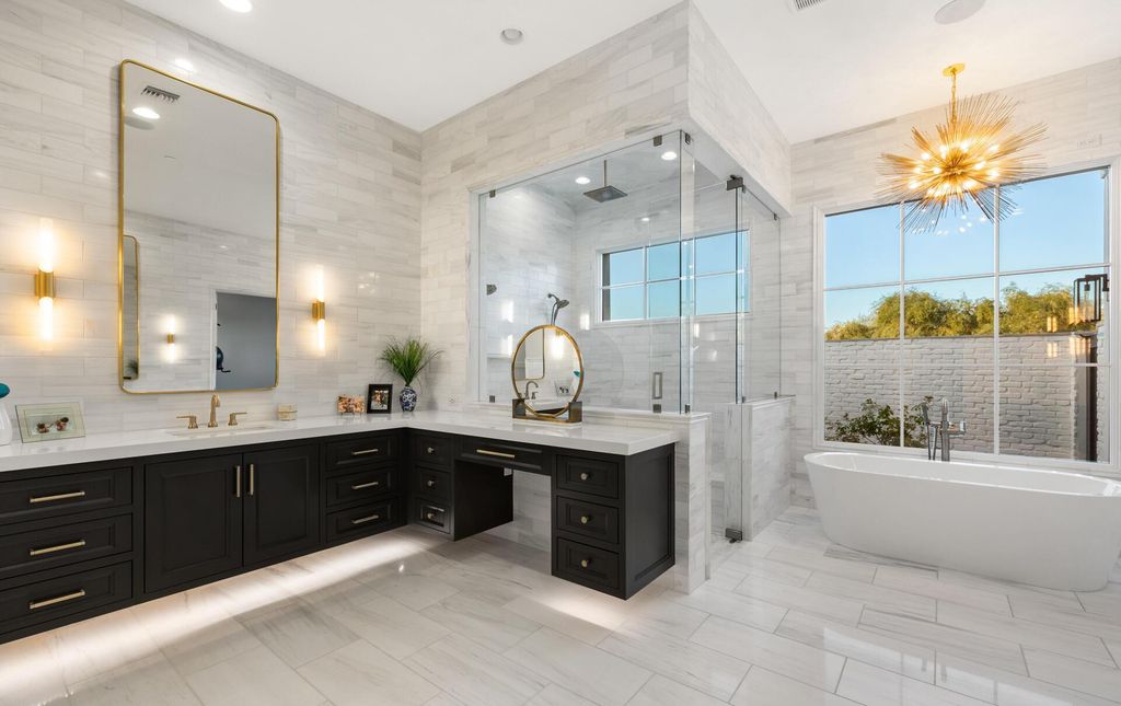 8311 N 53rd Street, Paradise Valley, Arizona is a transitional Mediterranean estate with amazing Mummy mountain views and tons of privacy showcases the pinnacle of resort style living. 