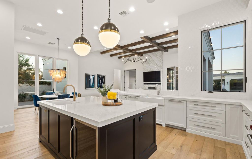 8311 N 53rd Street, Paradise Valley, Arizona is a transitional Mediterranean estate with amazing Mummy mountain views and tons of privacy showcases the pinnacle of resort style living. 