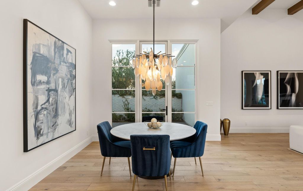 8311 N 53rd Street, Paradise Valley, Arizona is a transitional Mediterranean estate with amazing Mummy mountain views and tons of privacy showcases the pinnacle of resort style living. 