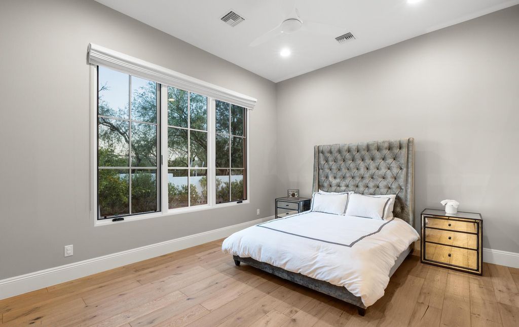 8311 N 53rd Street, Paradise Valley, Arizona is a transitional Mediterranean estate with amazing Mummy mountain views and tons of privacy showcases the pinnacle of resort style living. 