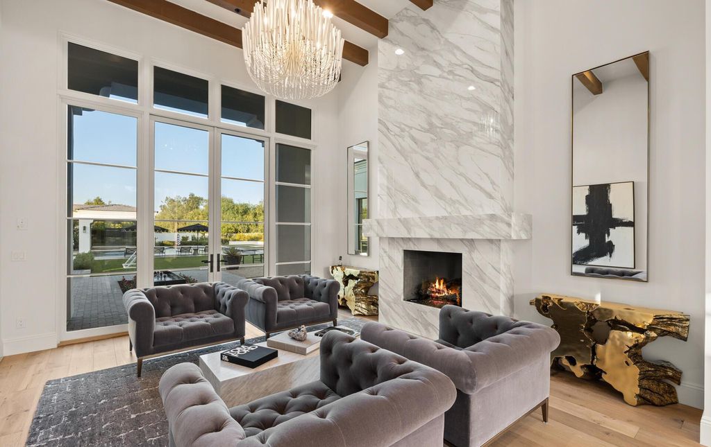 8311 N 53rd Street, Paradise Valley, Arizona is a transitional Mediterranean estate with amazing Mummy mountain views and tons of privacy showcases the pinnacle of resort style living. 