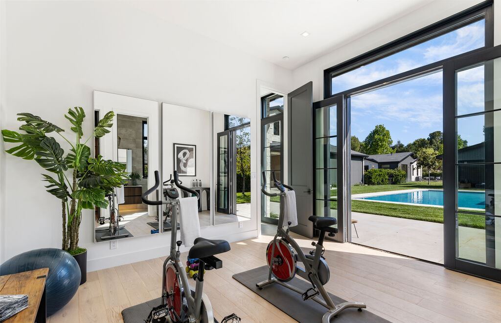 23650 Long Valley Rd, Hidden Hills, California is a beautiful contemporary farmhouse compound encompasses a grand corner in the exclusive guard-gated equestrian community of Hidden Hills.
