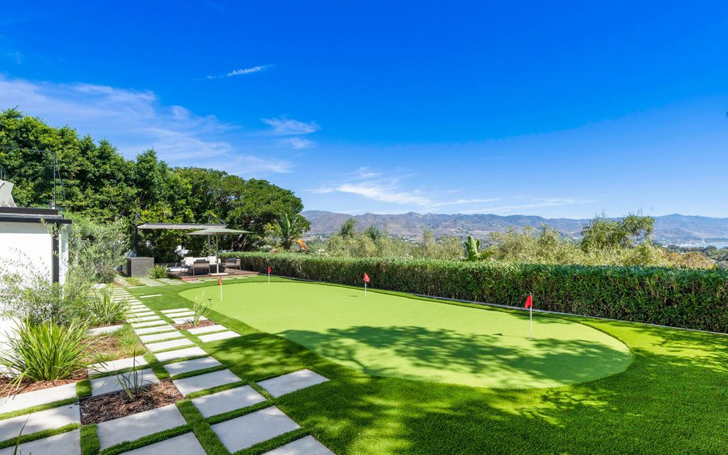 The Home in Malibu, a majestic estate Bbuilt on a palatial scale, with soaring ceilings, stunning woodwork, and bespoke fixtures, the residence has been entirely remodeled inside and out with impeccable attention to detail is now available for sale. This home located at 7052 Dume Dr, Malibu, California