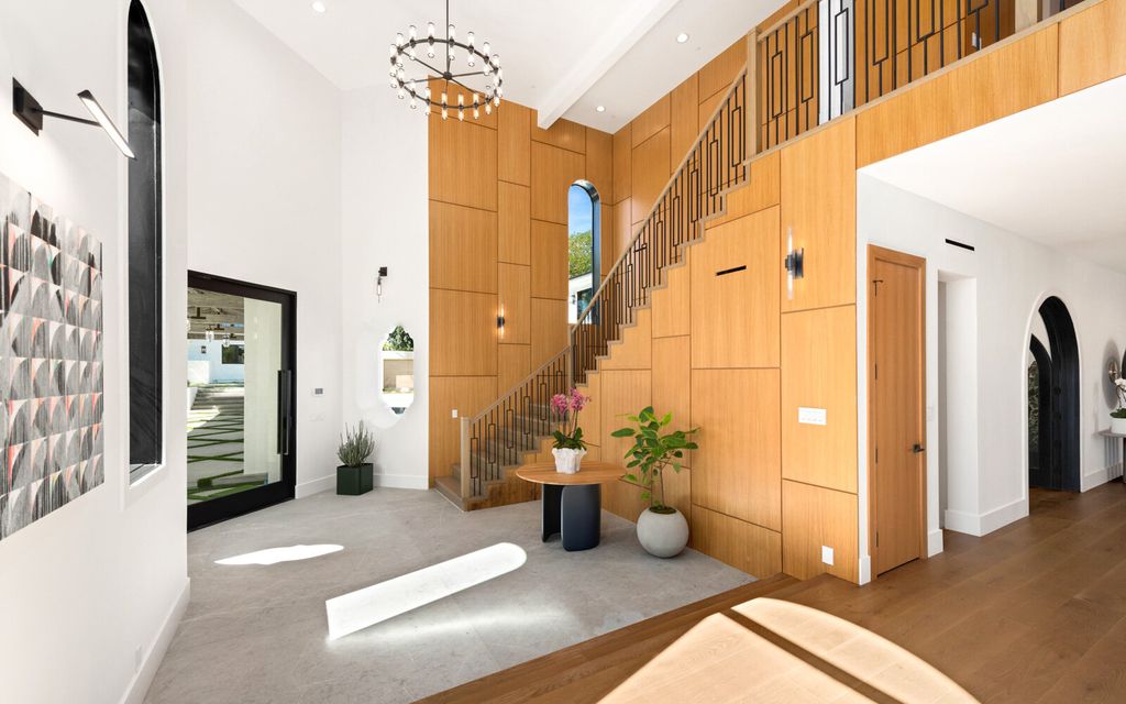 The Home in Malibu, a majestic estate Bbuilt on a palatial scale, with soaring ceilings, stunning woodwork, and bespoke fixtures, the residence has been entirely remodeled inside and out with impeccable attention to detail is now available for sale. This home located at 7052 Dume Dr, Malibu, California