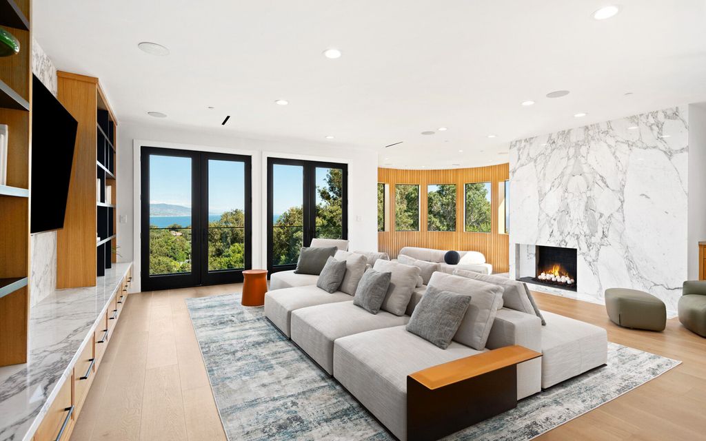 The Home in Malibu, a majestic estate Bbuilt on a palatial scale, with soaring ceilings, stunning woodwork, and bespoke fixtures, the residence has been entirely remodeled inside and out with impeccable attention to detail is now available for sale. This home located at 7052 Dume Dr, Malibu, California