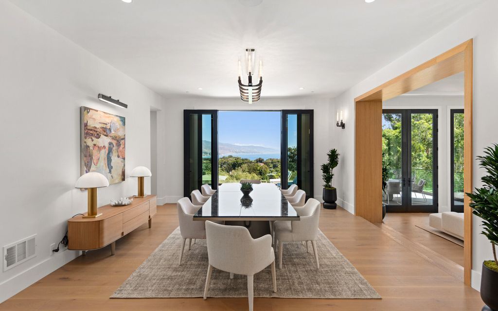 The Home in Malibu, a majestic estate Bbuilt on a palatial scale, with soaring ceilings, stunning woodwork, and bespoke fixtures, the residence has been entirely remodeled inside and out with impeccable attention to detail is now available for sale. This home located at 7052 Dume Dr, Malibu, California
