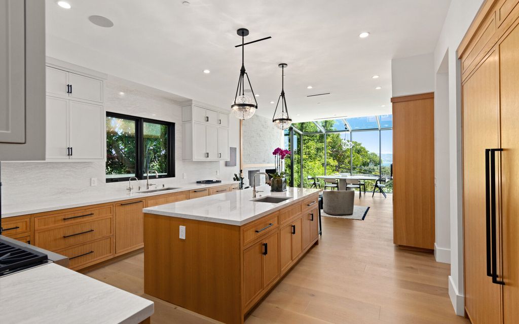 The Home in Malibu, a majestic estate Bbuilt on a palatial scale, with soaring ceilings, stunning woodwork, and bespoke fixtures, the residence has been entirely remodeled inside and out with impeccable attention to detail is now available for sale. This home located at 7052 Dume Dr, Malibu, California