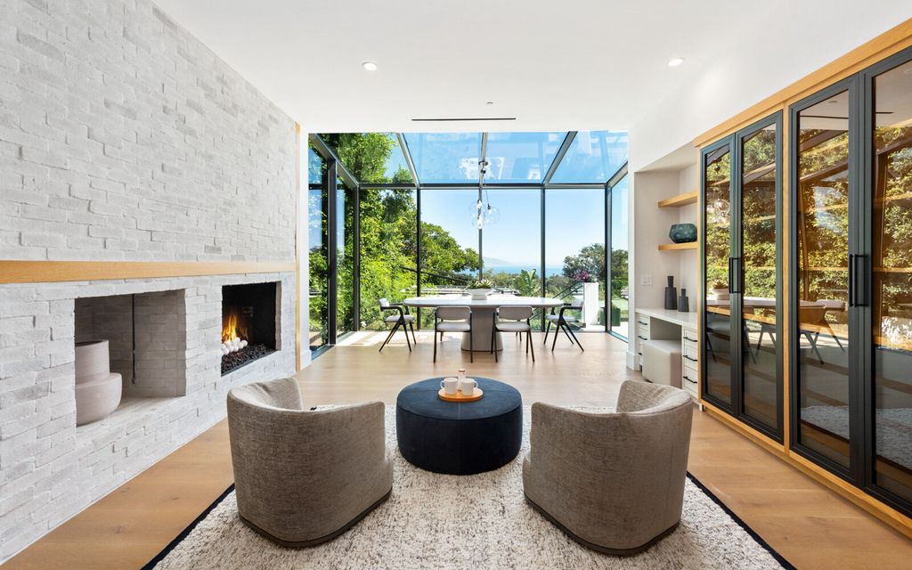 The Home in Malibu, a majestic estate Bbuilt on a palatial scale, with soaring ceilings, stunning woodwork, and bespoke fixtures, the residence has been entirely remodeled inside and out with impeccable attention to detail is now available for sale. This home located at 7052 Dume Dr, Malibu, California