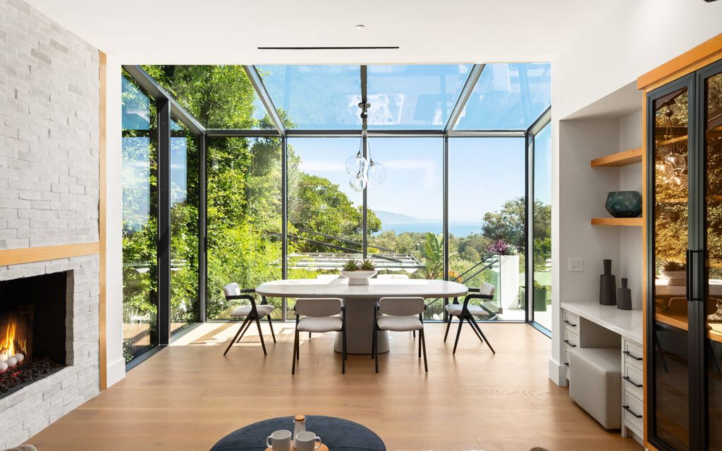 The Home in Malibu, a majestic estate Bbuilt on a palatial scale, with soaring ceilings, stunning woodwork, and bespoke fixtures, the residence has been entirely remodeled inside and out with impeccable attention to detail is now available for sale. This home located at 7052 Dume Dr, Malibu, California