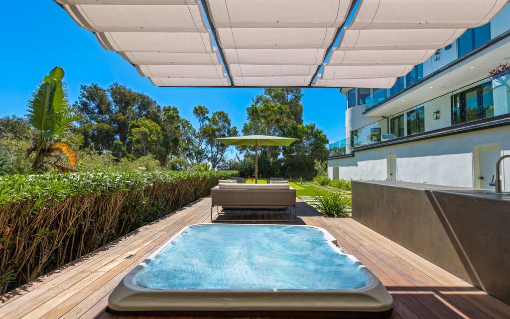 The Home in Malibu, a majestic estate Bbuilt on a palatial scale, with soaring ceilings, stunning woodwork, and bespoke fixtures, the residence has been entirely remodeled inside and out with impeccable attention to detail is now available for sale. This home located at 7052 Dume Dr, Malibu, California