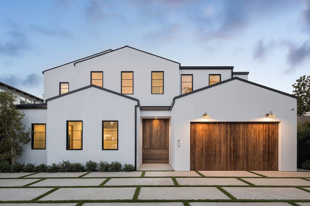 The House in Los Angeles, a newly constructed modern farmhouse ideally situated in the acclaimed Brentwood neighborhood featuring a flexible open layout blends the living and dining areas is now available for sale. This home located at 417 N Kenter Ave, Los Angeles, California