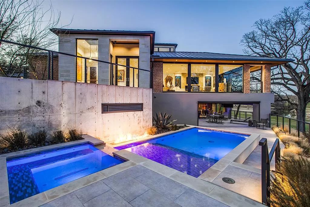 17214 Club Hill Drive, Dallas, Texas is a modern masterpiece perfectly situated with pristine views of both the Bent Tree & Preston Trail Golf courses along with its picturesque view of White Rock Creek.