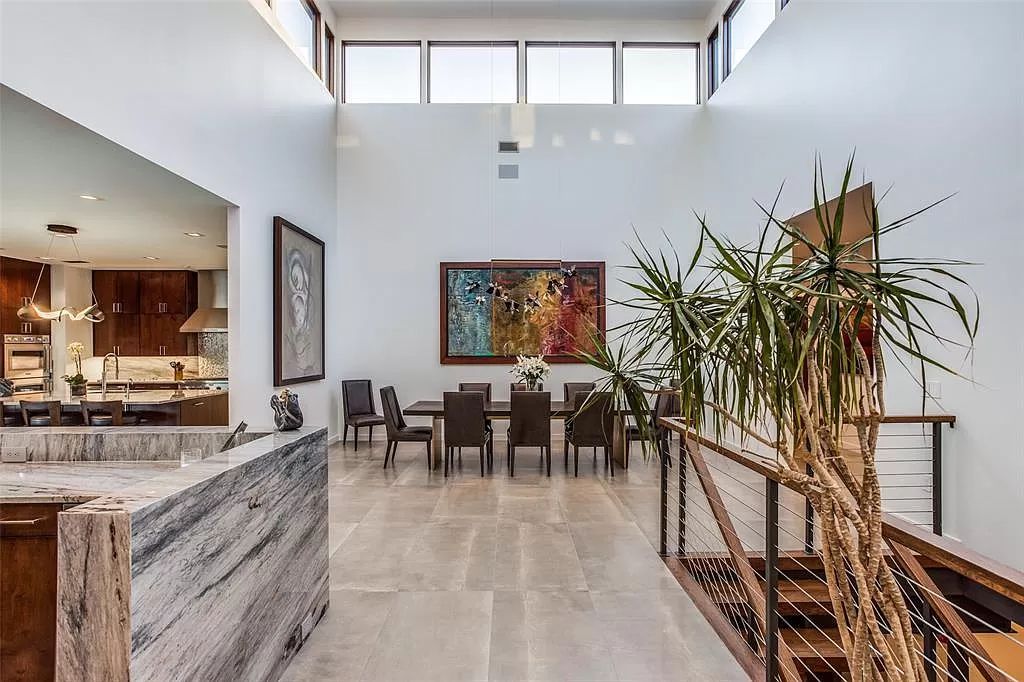 17214 Club Hill Drive, Dallas, Texas is a modern masterpiece perfectly situated with pristine views of both the Bent Tree & Preston Trail Golf courses along with its picturesque view of White Rock Creek.