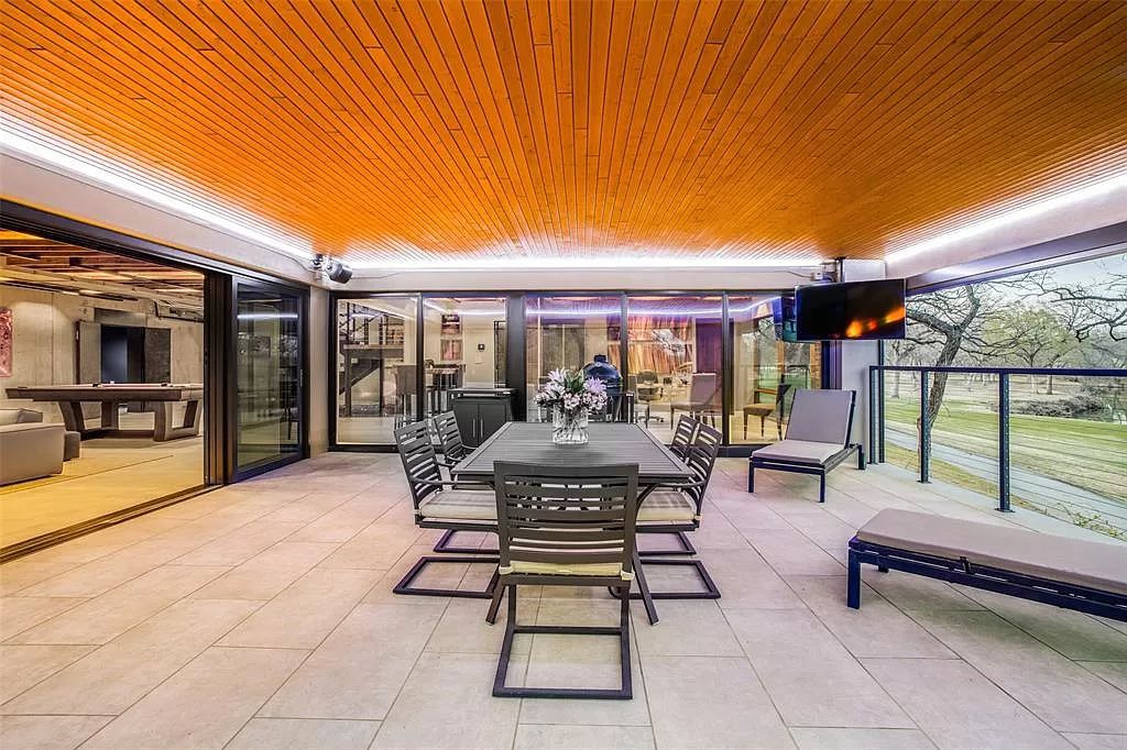 17214 Club Hill Drive, Dallas, Texas is a modern masterpiece perfectly situated with pristine views of both the Bent Tree & Preston Trail Golf courses along with its picturesque view of White Rock Creek.
