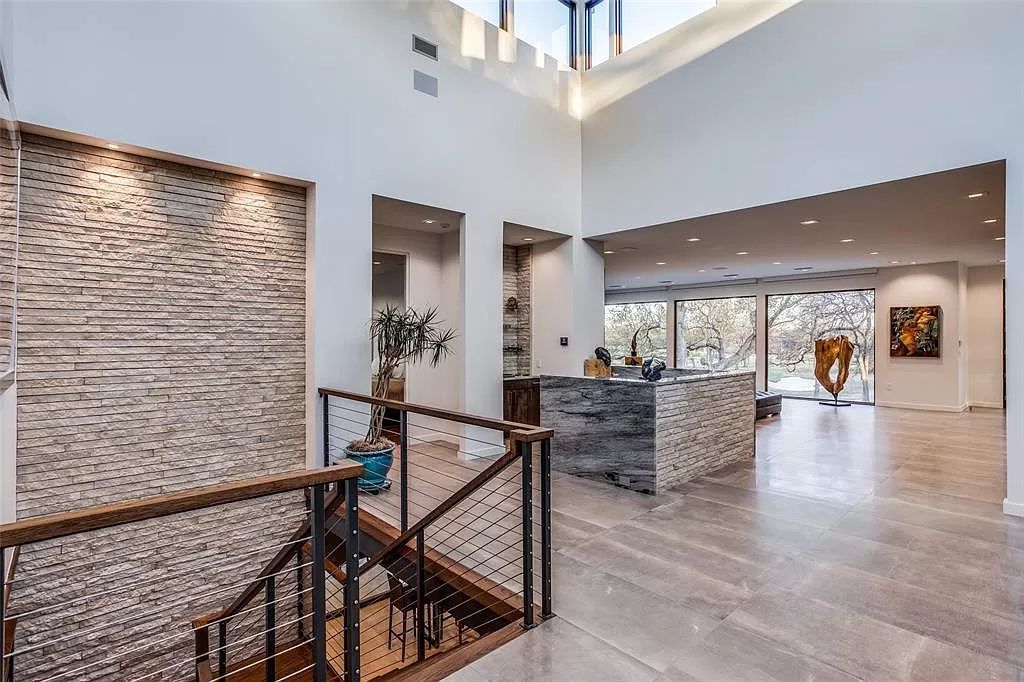 17214 Club Hill Drive, Dallas, Texas is a modern masterpiece perfectly situated with pristine views of both the Bent Tree & Preston Trail Golf courses along with its picturesque view of White Rock Creek.